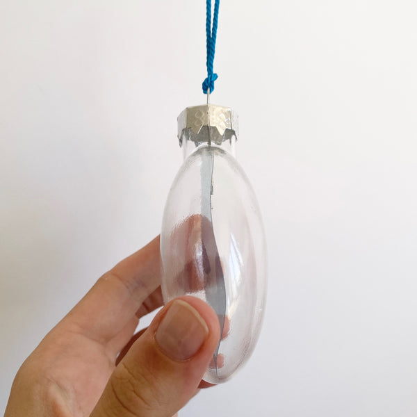 blue surfer standing